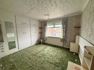 Bedroom One- click for photo gallery